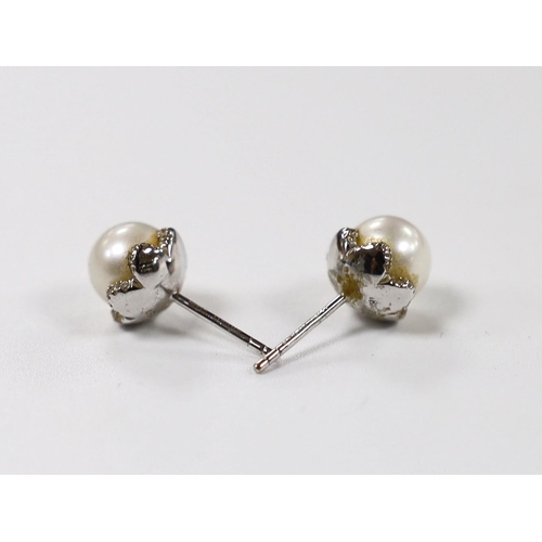 1964 - A pair of 18ct white gold, cultured pearl and diamond chip set ear studs, pearl diameter 8.15mm, gro... 