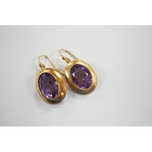 1967 - A pair of Victorian yellow metal and amethyst set oval drop earrings, 21mm, gross weight 6.3 grams.... 