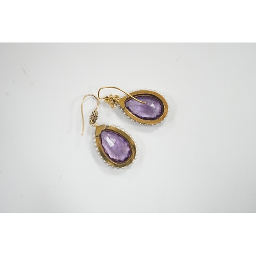 1968 - A pair of Victorian yellow metal, amethyst and seed pearl set teardrop shaped drop earrings, 21mm, g... 