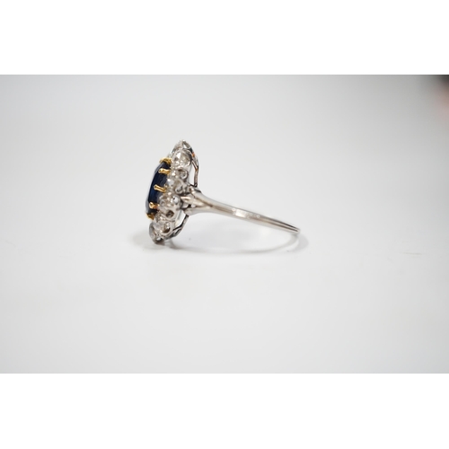 1994 - A white metal, synthetic sapphire and diamond set oval cluster ring, size M, gross weight 3.8 grams.... 