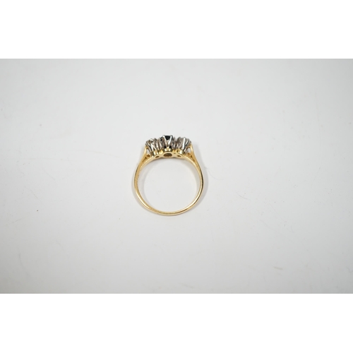 1995 - An 18ct, sapphire and diamond set three stone ring, size N, gross weight 2.8 grams.