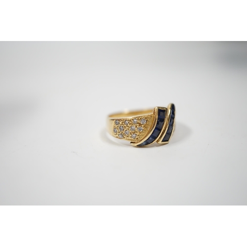 1996 - A modern 750 yellow metal, sapphire and diamond chip set dress ring, size K, gross weight 4.8 grams.... 