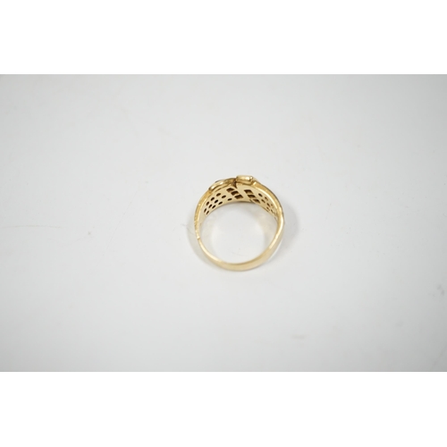 1996 - A modern 750 yellow metal, sapphire and diamond chip set dress ring, size K, gross weight 4.8 grams.... 