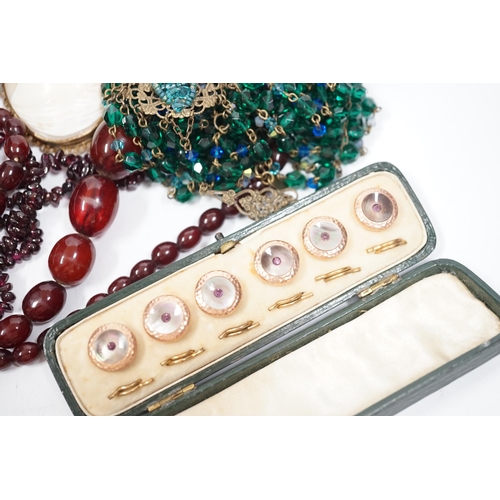 2000 - A group of assorted costume and other jewellery including a simulated cherry amber necklace, 52cm, g... 