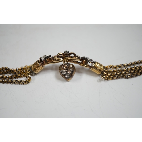 2003 - An antique yellow metal (test as 18ct) and rose cut diamond set triple strand bracelet, the central ... 