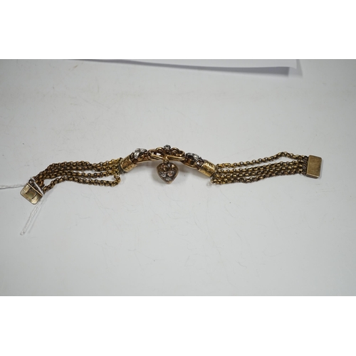 2003 - An antique yellow metal (test as 18ct) and rose cut diamond set triple strand bracelet, the central ... 