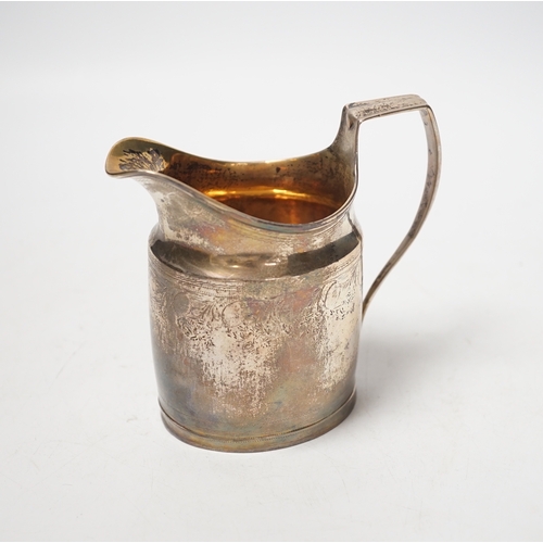 1879 - A George III silver cream jug, marks rubbed, 10.3cm.