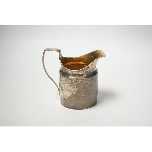 1879 - A George III silver cream jug, marks rubbed, 10.3cm.