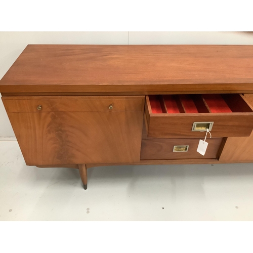 1014 - A Greaves and Thomas mid century teak sideboard, width 220cm, depth 45cm, height 76cm