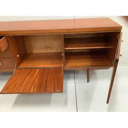 1014 - A Greaves and Thomas mid century teak sideboard, width 220cm, depth 45cm, height 76cm