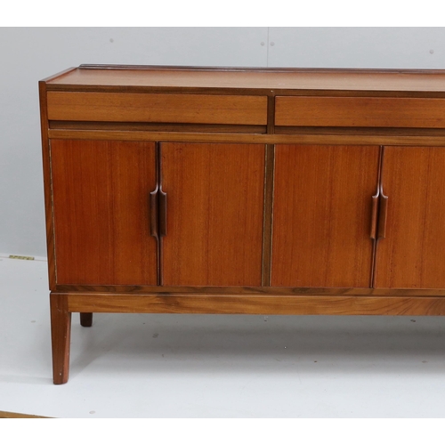 1042 - Robert Heritage for Archie Shine, a mid century teak sideboard, length 238cm, depth 46cm, height 86c... 