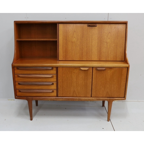 1069 - John Herbert for Younger Furniture - A teak high sideboard, width 145cm, depth 46cm, height 130cm... 