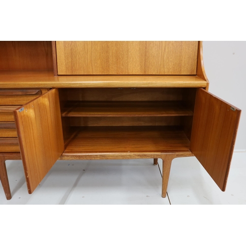 1069 - John Herbert for Younger Furniture - A teak high sideboard, width 145cm, depth 46cm, height 130cm... 