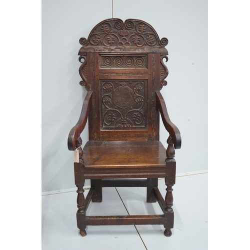 1104 - A pair of 17th century style inlaid panelled oak wainscot chairs, width 57cm, depth 40cm, height 121... 