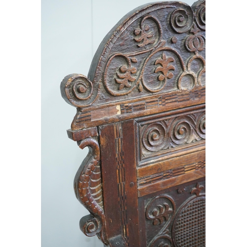 1104 - A pair of 17th century style inlaid panelled oak wainscot chairs, width 57cm, depth 40cm, height 121... 