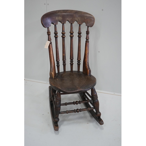 1105 - A Victorian elm and beech Windsor rocking chair, height 92cm