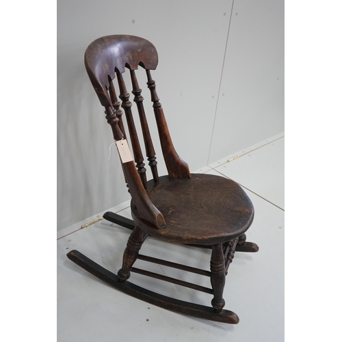 1105 - A Victorian elm and beech Windsor rocking chair, height 92cm