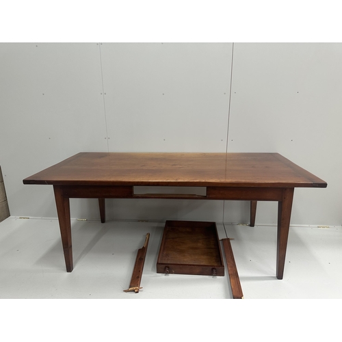 1117 - A reproduction French Provincial style rectangular farmhouse table, with single extension, drawer ru... 