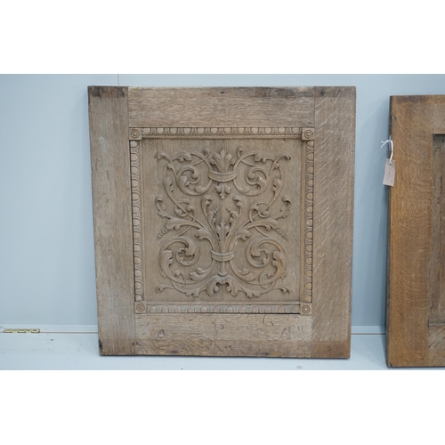 1121 - A pair of late 19th century carved oak panels, width 71cm, height 74cm