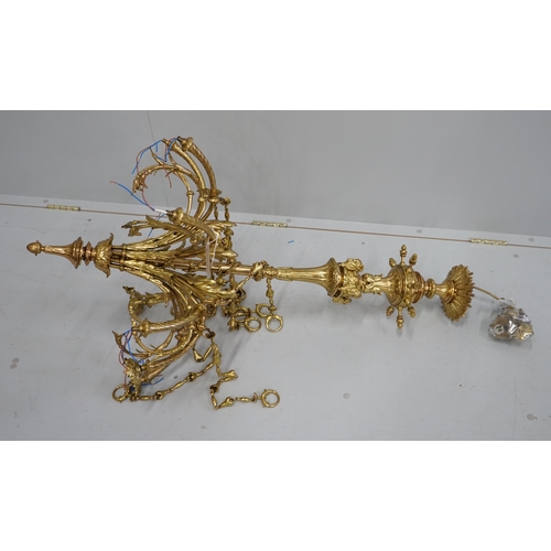 1122 - A gilt metal eight branch electrolier, height 106cm