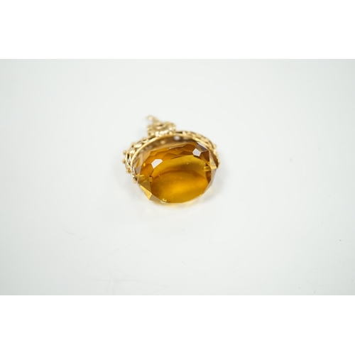 2023 - A 9ct and citrine coloured paste set swivelling fob, 30mm, gross weight 14.7 grams.