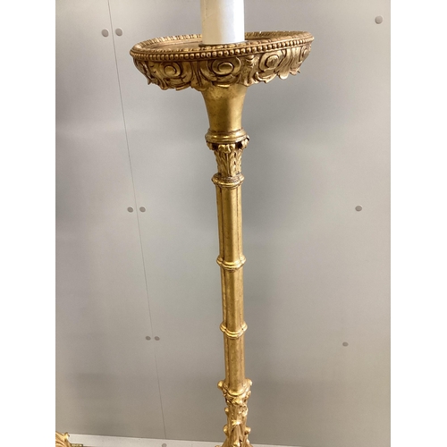 103 - A pair of 18th century style carved gilt cluster column tripod standard lamps, height including shad... 