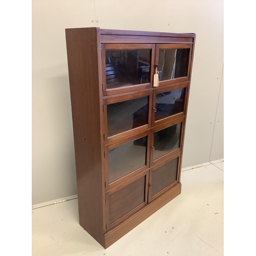 105 - An early 20th century glazed mahogany bookcase, width 81cm, depth 27cm, height 126cm