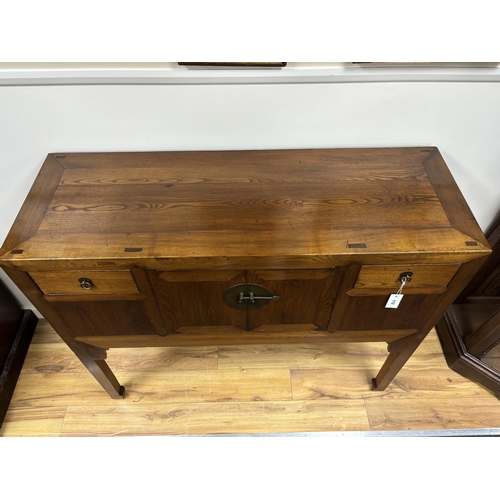 112 - A Chinese elm jumu cabinet, width 128cm, depth 44cm, height 107cm