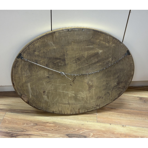 117 - An oval marginal plate wall mirror, width 86cm, height 66cm