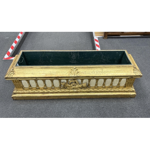 125 - A mid 19th century giltwood and gesso jardiniere, with liner, width 120cm, depth 34cm, height 34cm... 