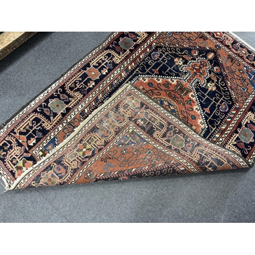 130 - A Hamadan blue ground rug, 150 x 112cm