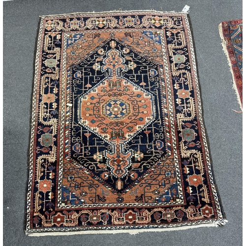 130 - A Hamadan blue ground rug, 150 x 112cm