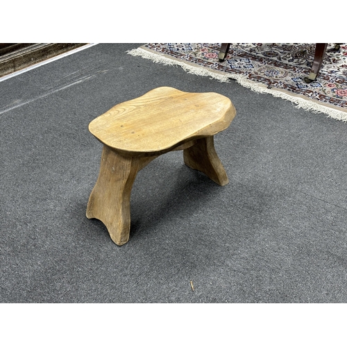 131 - A provincial oak stool, width 48cm, depth 30cm, height 32cm