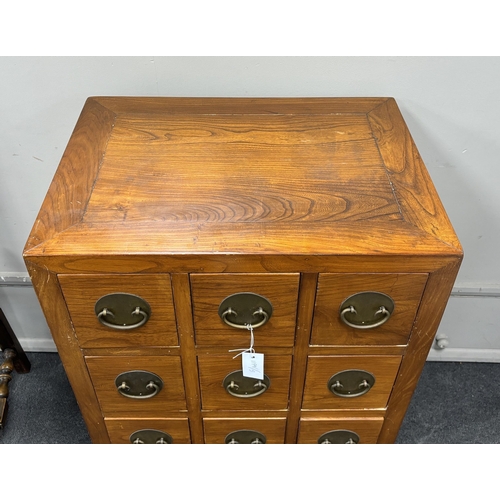 139 - A Chinese jumu chest of twelve drawers, width 61cm, depth 45cm, height 91cm.