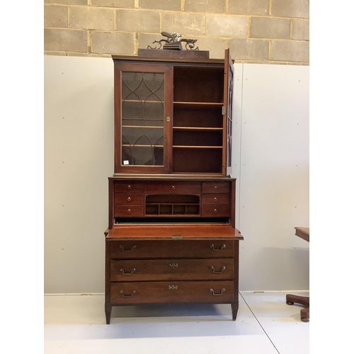 14 - A French mahogany escritoire bookcase, width 112cm, depth 59cm, height 244cm