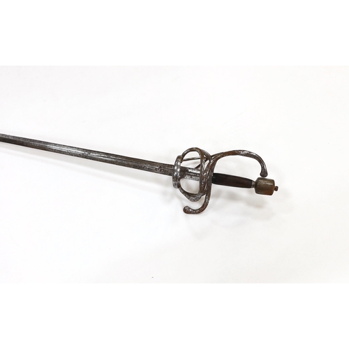 251 - A swept hilt rapier, c.1620, blade fullered at the forte, iron guard of conventional form with later... 