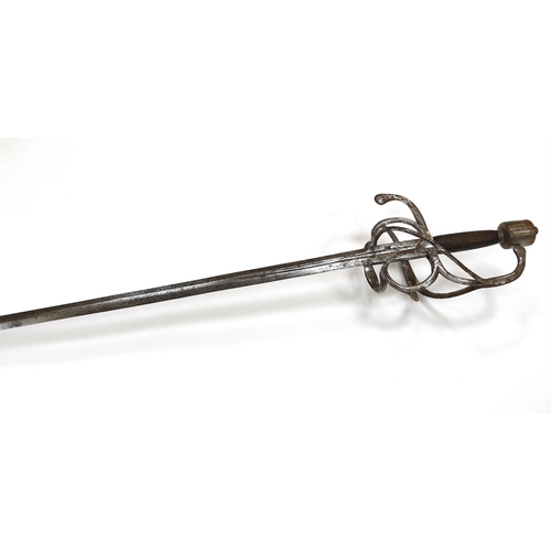 251 - A swept hilt rapier, c.1620, blade fullered at the forte, iron guard of conventional form with later... 