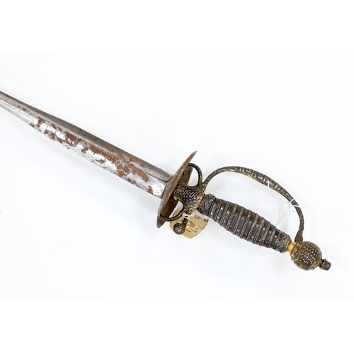 255 - A French iron hilted small sword, hilt with flutes and tiny gold dots, the knuckle guard with key de... 