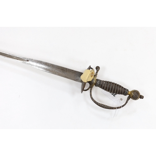 255 - A French iron hilted small sword, hilt with flutes and tiny gold dots, the knuckle guard with key de... 