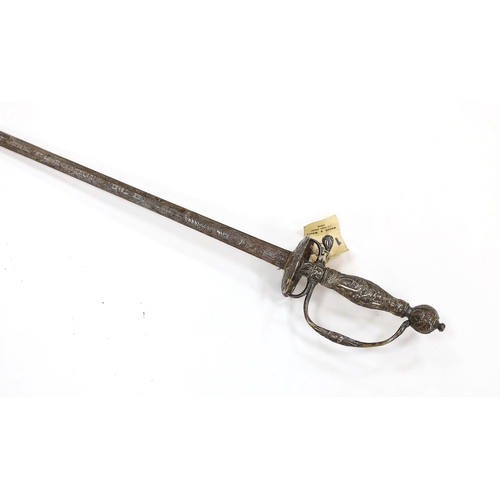 258 - A French silver hilted small sword, c.1770, the guard, pommel and grip all chiselled with putti, flo... 