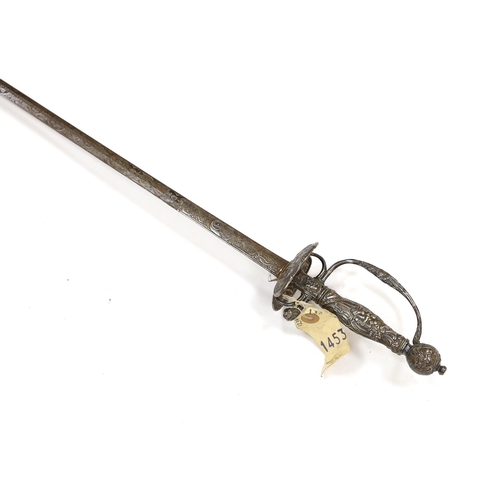 258 - A French silver hilted small sword, c.1770, the guard, pommel and grip all chiselled with putti, flo... 