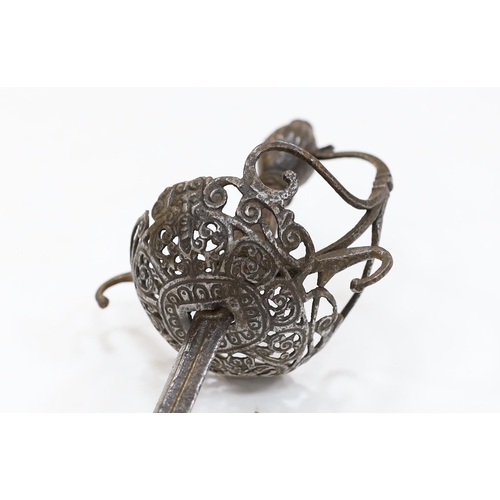 259 - A mid 17th century English rapier, with pierced and chiselled cup guard, steel pommel and leather gr... 