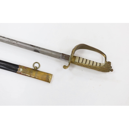 266 - A George V naval officers sword, maker Grieves, in a leather scabbard, guard engraved G.P. Bewley, ... 