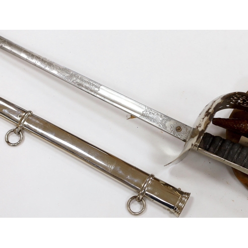 267 - A George V officer's sword, maker Hawksworth Sheffield, in chromed scabbard, blade 82cm