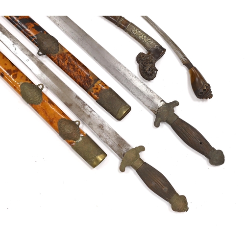 274 - Two Chinese short swords (Jian) in faux tortoiseshell veneered scabbards and a Sumatran knife dagger... 