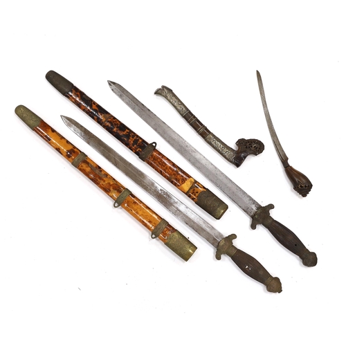 274 - Two Chinese short swords (Jian) in faux tortoiseshell veneered scabbards and a Sumatran knife dagger... 