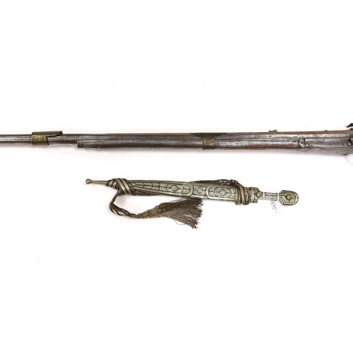 275 - A 19th century Albanian flintlock miquelet lock rifle (Balkan long arm) and a Caucasian style dagger... 