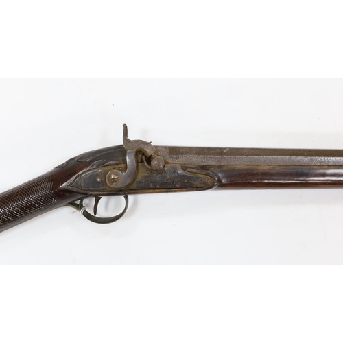 284 - A 1786 percussion 12 bore fowling piece, converted from flintlock, with a fully stocked half octagon... 