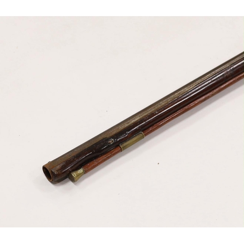 284 - A 1786 percussion 12 bore fowling piece, converted from flintlock, with a fully stocked half octagon... 