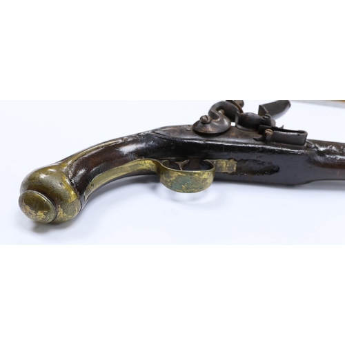 289 - An early 19th century Balkan flintlock holster pistol. with limited engraving to lock and barrel and... 